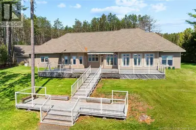 Welcome to The Pines, an extraordinary opportunity to own an executive-style home with panoramic vie...