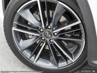 The 2025 INFINITI QX50 Sport is a bold, blacked-out luxury SUV that currently holds the #1 spot for... (image 6)
