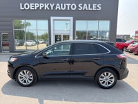 2021 Ford Edge Titanium Luxury, Comfort & Confidence | Loeppky Auto Sales Experience premium comfort... (image 1)