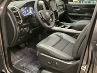 The 2026 Ram 1500 Sport, presented in a sophisticated gray finish, offers powerful 44 capabilities c... (image 9)