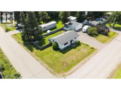 SHOP SHOP SHOP! This 3 bedroom family home has an absolutely beautiful lot, fenced yard, and a 24 x...