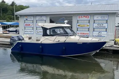 * Aluminum Alloy * Enclosed Pilothouse * Twin Outboards * The Profisher line of high quality aluminu...