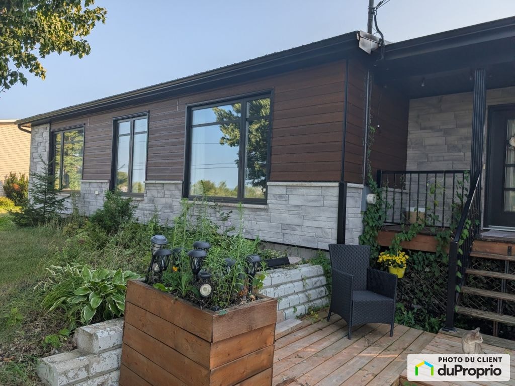 $450,000 - Bungalow for sale in St-Pierre-De-La-Riviere-Du-Sud — photo 1