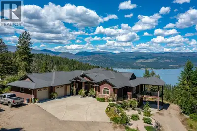 Picture 1.35 acres of total privacy, Okanagan Lake stretching out from every angle, and room to buil...