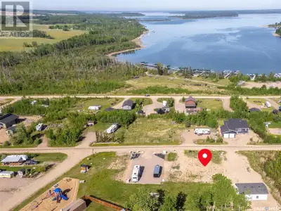 This lakeview lot on Lac Des Iles Lake in Lauman's Landing Subdivision is ready for your RV or park...