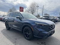 The 2024 Honda CR-V Hybrid EX-L in stunning Canyon River Blue Metallic offers an unparalleled blend... (image 2)