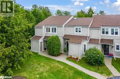 Bright End-Unit Townhome in a Sought-After Location! This spacious end-unit townhome is filled with...