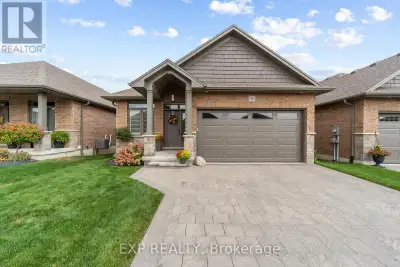 Golf course living meets ultimate privacy at 159 Collins Way, Unit 26. This stunning 2+1 bedroom, 3-...