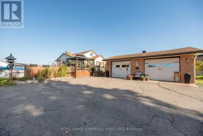 Discover a rare-find home situated on a double lot with breathtaking mature gardens, trees & vibrant...