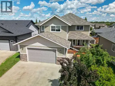 Fully Finished 2 Storey with Walkout Basement & Two Garages located on a quiet close in Blackfalds....