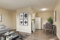 Amenities: Spacious Rooms • Affordable Parking • Heat & Water Included Suite & Building: Bachelor an... (image 1)