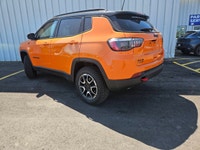 For a quick response please text 403-820-9940. AMVIC licensed business The 2026 Jeep Compass Trailha... (image 2)