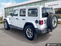 Unleash the spirit of adventure with the 2020 Jeep Wrangler Unlimited Sahara in striking Bright Whit... (image 2)