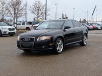 This pre-owned 2008 Audi A4 2.0T offers a timeless design with a sleek black exterior paired with a... (image 1)