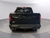 Experience the 2027 Ram 1500 Rebel in stunning black with robust 44 capabilities. This new truck del... (image 3)