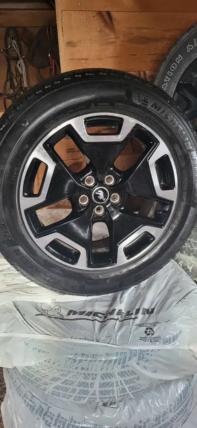 Selling a set of four (4) Factory alloy wheels & tires. Removed after approximately 26k km from a 20...