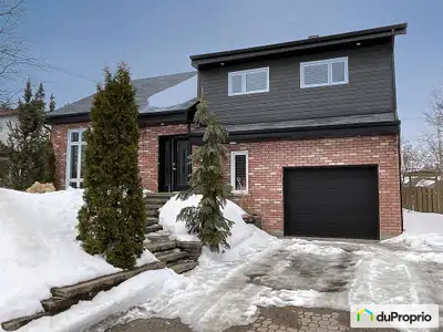 Superbe propriété située dans le quartier recherché Domaine du Roi (quartier des 21) à Chicoutimi. C...