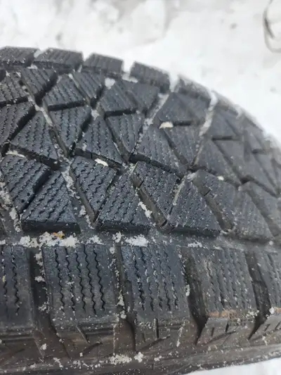 Set of 4 Blizzak tires 235/70R16 on steel rims, some rust on rims, tires in good condition, call Pet...