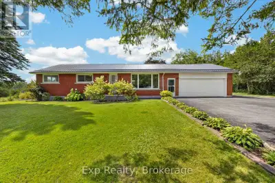 Updated. All Brick. Two-Car Garage. Minutes to Town! This beautifully updated 3-bedroom bungalow che...