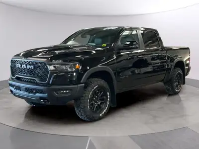 Experience the 2027 Ram 1500 Rebel in stunning black with robust 44 capabilities. This new truck del...