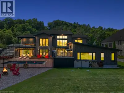 PRESENTING THE RIVER HOUSE, OUTSTANDING MODERN LUXURY! This custom built masterpiece sits on 2.5 acr...