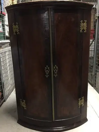 Beautiful Victorian wall cabinet with solid brass hardware. Height 37.5” Depth 18”