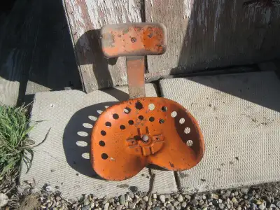 Antique metal seat and backrest. Allis Chalmers seat? $200. Thanks.