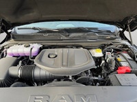 This 2026 RAM 1500 REBEL CREW CAB 4X4 has the following options Lux Leather Trimmed Bucket Seats, Re... (image 8)