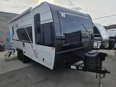 Winnebago Thrive travel trailer 18FBS highlights: Olympic Queen bed Jack Knife Sofa Slide Rear Corne...