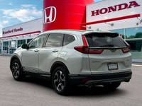 Why Choose the CR-V Touring? The Touring trim eliminates the need to upgrade or compromise on featur... (image 4)