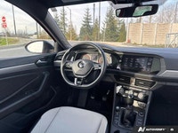 The 2019 Volkswagen Jetta Highline, presented in eye-catching Habanero Orange Metallic with a sophis... (image 8)