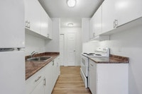 Amenities: Air Conditioning • Heat & Water Included • Great Location Suite & Building: Spacious one-... (image 4)