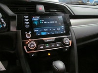 Built to deliver everyday value, this 2021 Honda Civic Sedan LX is a smart compact car with the comf... (image 5)