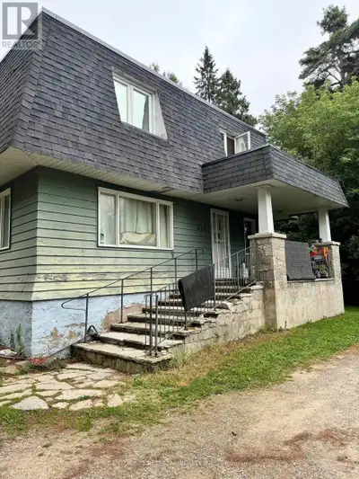 2 Acres Zoned Development. Approximately 1/2 - Acre Development Potential Along Veteran Frontage. Se...