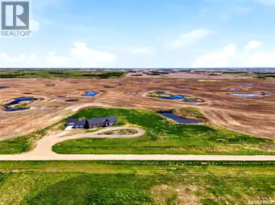 Escape the city and embrace the freedom of acreage living with this spacious 2,378 sq. ft. bungalow...