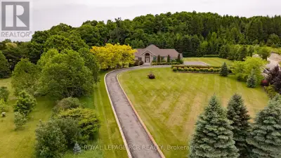 Welcome to your dream custom estate at 5 Woodlot Court, nestled on 2.95 Acres in the prestigious Pal...