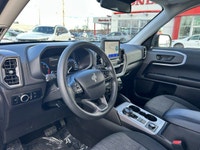 Conquer urban routes and unpaved paths with equal confidence in this striking 2023 Ford Bronco Sport... (image 9)