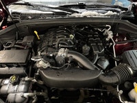 Experience the ultimate fusion of muscle-car attitude and three-row utility in this aggressive SUV,... (image 7)