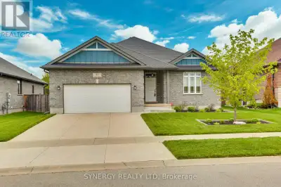 Introducing a stunning 3-bedroom, 3-bathroom bungalow situated on a generously sized lot, complete w...
