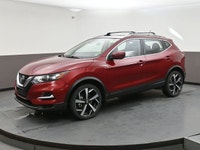 Powered by a fuel-efficient 2.0L 4-cylinder engine paired with Intelligent AWD, this 2023 Nissan Qas... (image 2)