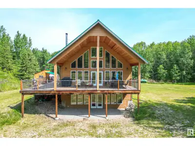 Built to last & stand the test of time, this beautifully designed home located 55 mins from Edmonton...