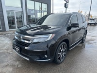 New Arrival! Drive home comfort, space, and reliability in this 2019 Honda Pilot Touring 8 Passenger... (image 7)
