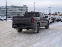 The 2026 Ram 1500 Sport in Granite Crystal Metallic delivers bold styling and impressive capability,... (image 6)