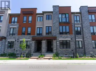 Welcome to 3 Steamboat Way in the heart of Port Whitby! This stylish and modern townhome offers brig...