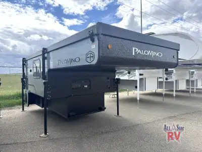 Palomino Backpack Edition truck camper SS-1251 highlights: Queen Bed 20,000 BTU Furnace Electric Roo...