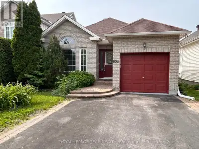 Welcome to this fantastic opportunity, a beautifully updated bungalow with a walkout basement, nestl...