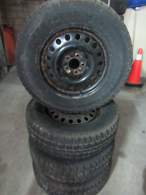 245 65R17 COOPER DISCOVERER SET OF 4 SNOW TIRES OF 5 BOLT RIMS, GOOD TREAD DEPTH