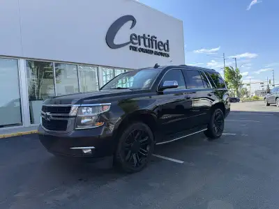 Command the road in this 2016 Chevrolet Tahoe LTZ, a full-size luxury SUV that delivers exceptional...