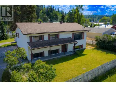 Investment opportunity! The main floor features a bright open-concept living and dining area, front...