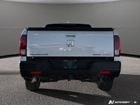 This Honda Ridgeline boasts a Regular Unleaded V-6 3.5 L/212 engine powering this Automatic transmis... (image 4)